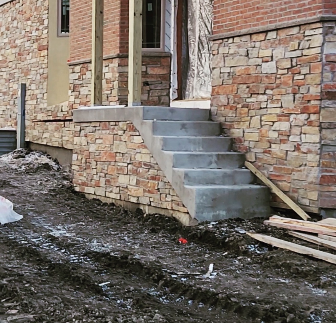 New masonry construction with stone veneer